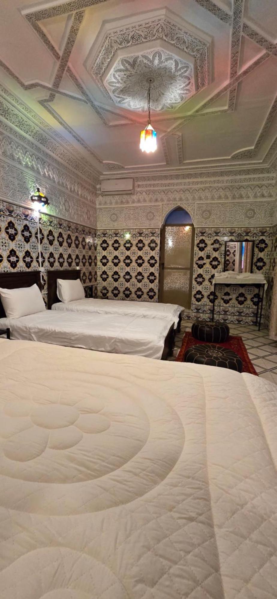 Chambre Quadruple avec Salle de Bains Privative