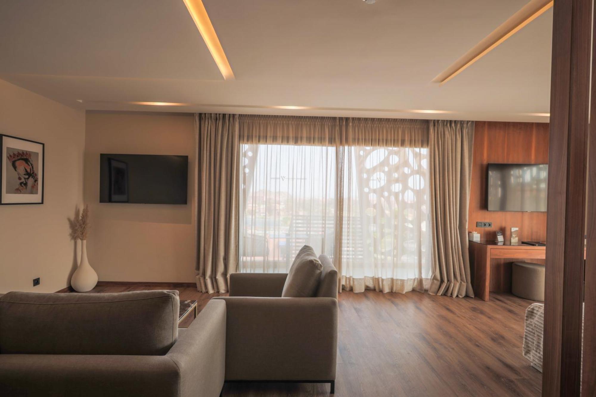 Suite Lit King-Size avec Balcon